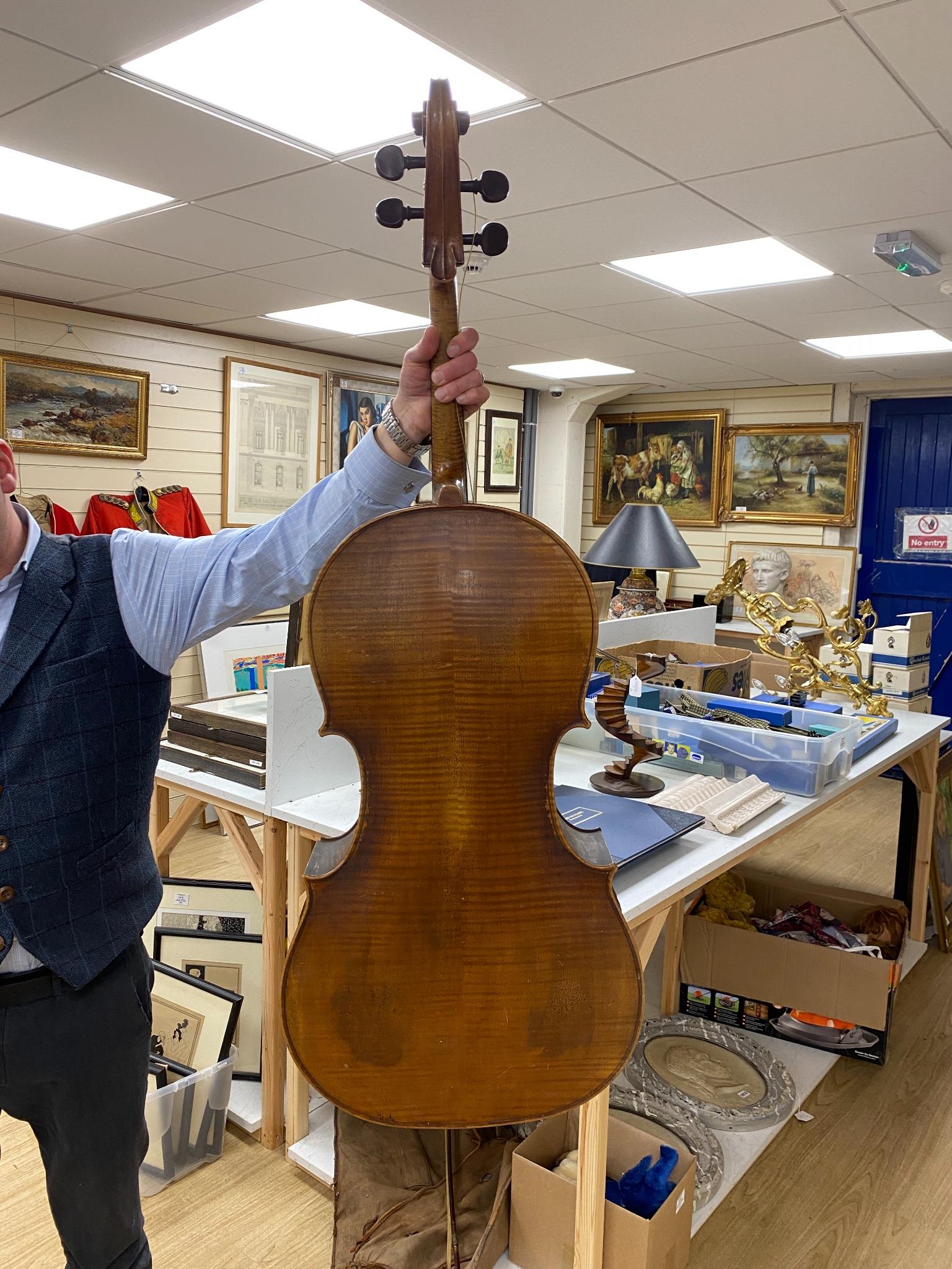 A late 19th century French cello, lob 75.5cm, canvas case with bow